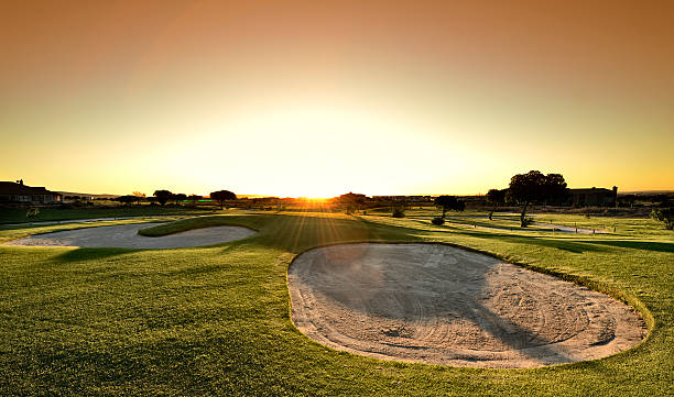 istock Golf bunker at sunset with lens flare 180726314