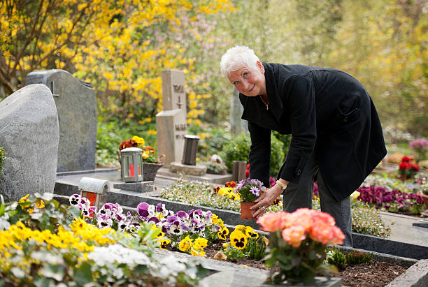 istock Senior woman working on cemetery 180726693