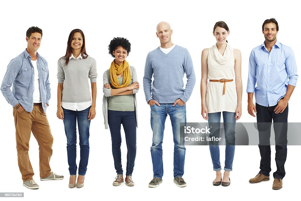 Stylish and casual line-up Casually dressed group of young adults standing against a white background People Stock Photo