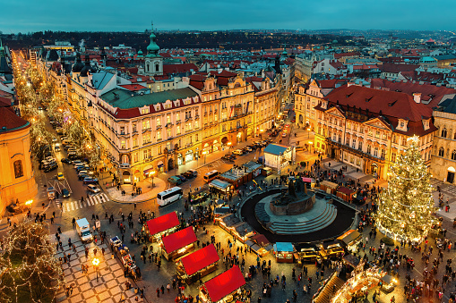 Aerial evening view of the famous Christmas market on the Old Town Square in Prague, Czechia.