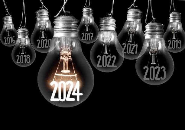 istock Light Bulbs with New Year 2024 1807285375
