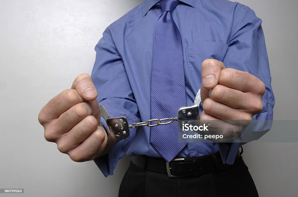 handcuffed - Lizenzfrei Bändigen Stock-Foto