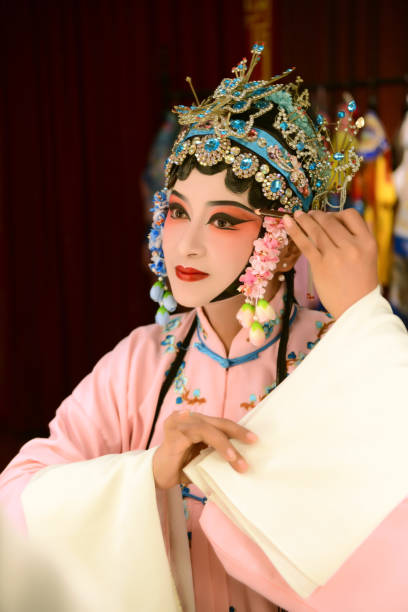 istock A  Chinese woman performing Beijing Opera on stage 1807299089