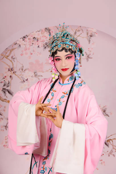 istock A  Chinese woman performing Beijing Opera on stage 1807299102