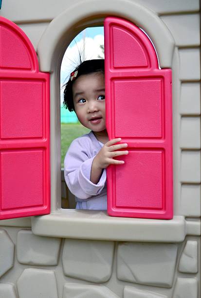 istock Little girl playing at the school yard 180731381