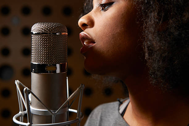 Female Vocalist In Recording Studio Laying down vocal track diva human role stock pictures, royalty-free photos & images