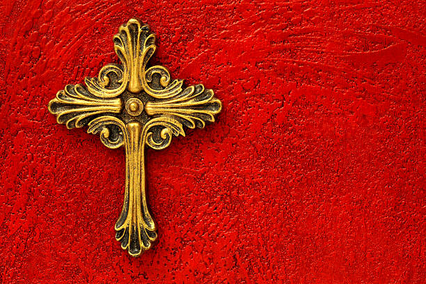 Gold Cross on Red Textured Background