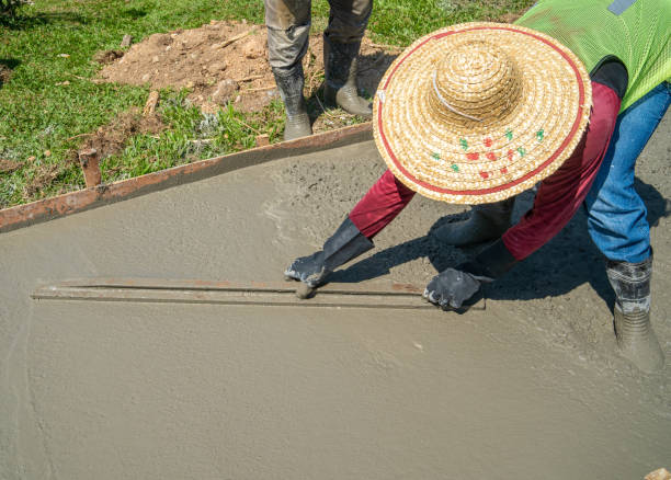 istock Workers pouring concrete at outdoor 1807325753