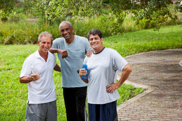 istock Men walking in park after exercising 180732736