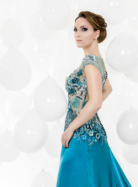 istock woman in blue dress 180732965
