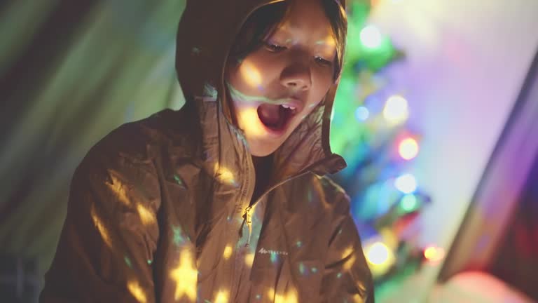 ็Happy young girl, happiness during christmas.