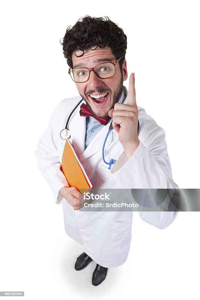 Lustiger männlichen Arzt hält Buch - Lizenzfrei Arzt Stock-Foto