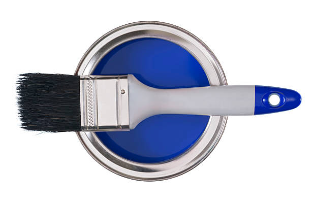 istock Paint brush on a tin of blue paint 180733619