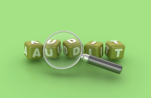 Audit Buzzword Cubes with Magnifying Glass - Color Background - 3D Rendering