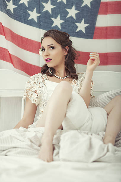 istock Female Holding An American Flag 180733720