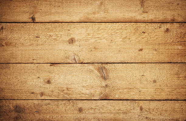 istock Overhead view of old light brown wooden table 180733739