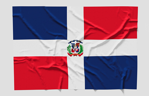Flag of the Dominican Republic.  Fabric textured Flag of the Dominican Republic isolated on white background. 3D illustration