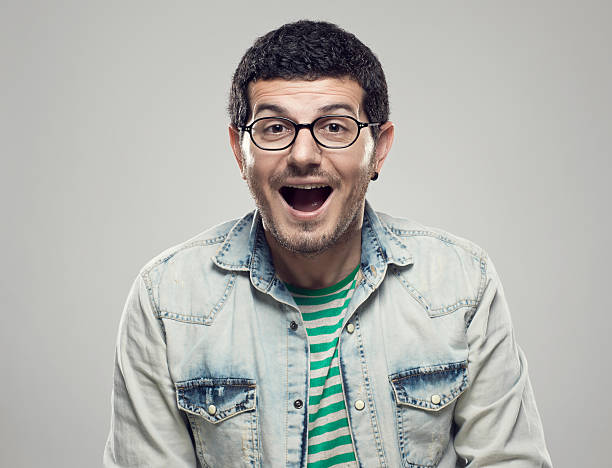 istock Portrait of young man with surprised expression 180734468
