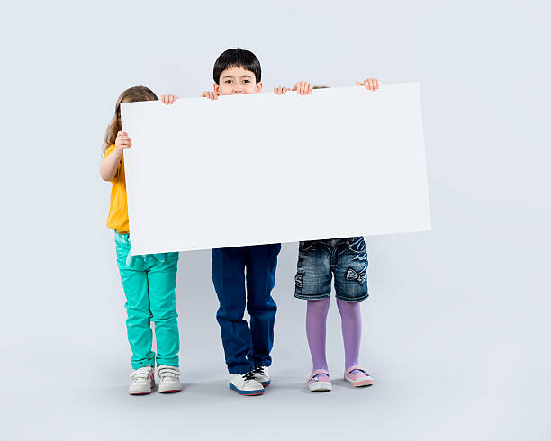 istock Preschoolers With Blank Sign 180734522
