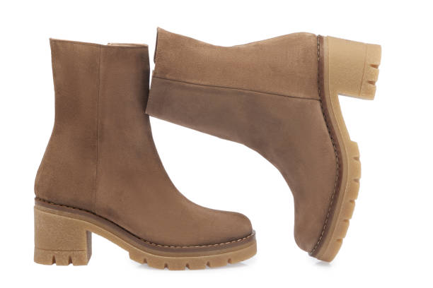 istock Suede Woman Boots On White Background 1807347404