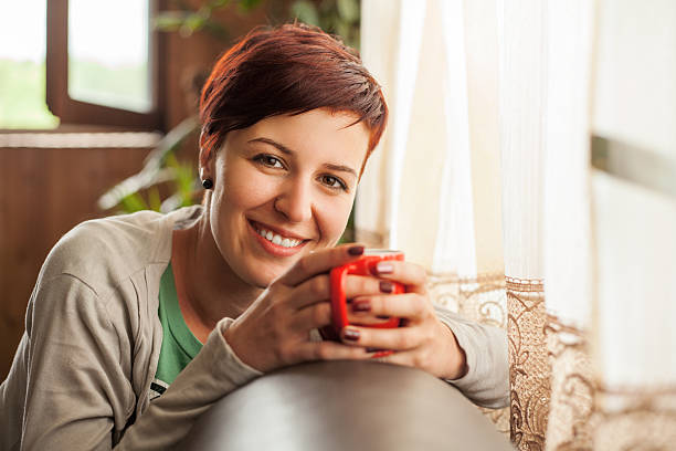 istock Woman with cup of coffee 180734917