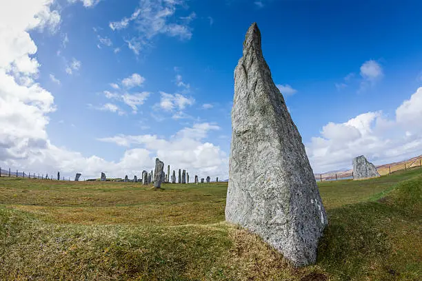 "The ancient standing stones of Callanish (or Calanais) on Lewis in the Outer Hebrides of Scotland. Built about 5000 years ago, the deeply textured stones of Callanish are arranged in allignments of avenues and a central circle not unlike a celtic cross."