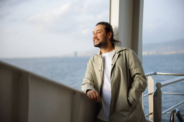 istock Man traveling on ferry through Bosphorus in Izmir 1807355738