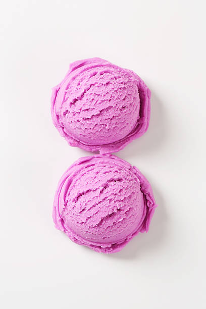 istock Two scoops of purple ice cream on white background 180735611
