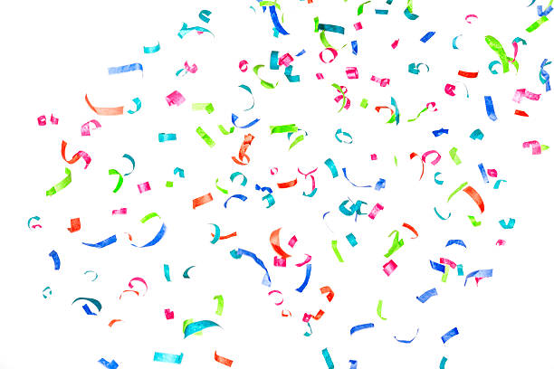 istock Multicolored paper confetti or streamers falling isolated on white 180735620
