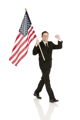 Business man holding flag