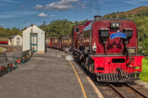 Steam train at the station of Beddgelert. Snowdonia, Wales, United Kingdom.
