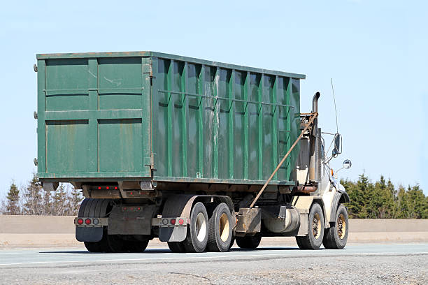 istock Waste Management, Dumpster Bin Truck Travelling Interstate Highway 180736346