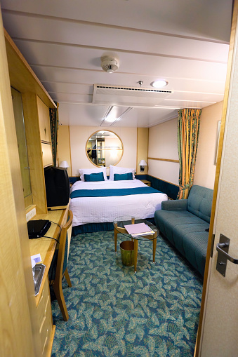 Cruise ship cabin with queen size bed