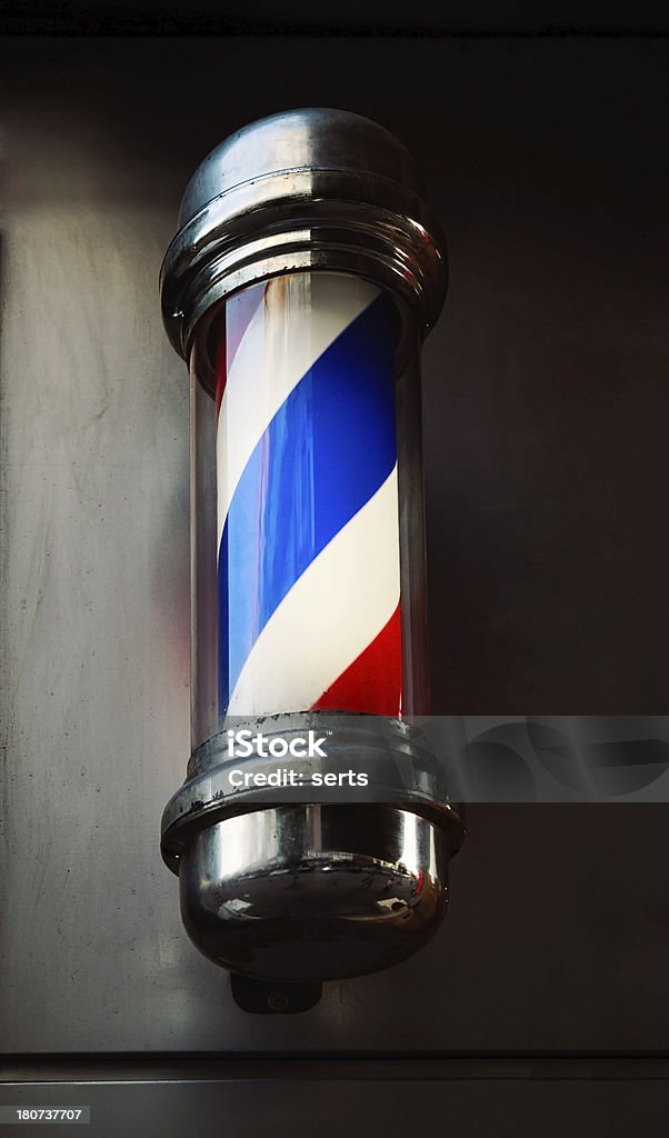 Barbershop Pole Barber sign on wall. Outdoor shot Barbers Pole Stock Photo