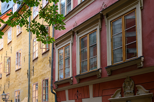 Colorful old buildings in fashionable neighborhood of central Copenhagen.