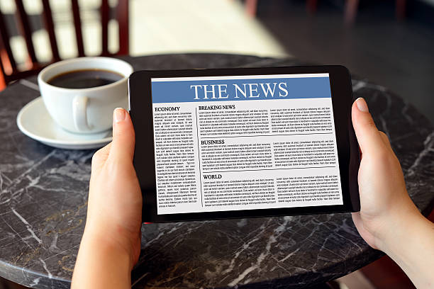istock Reading news with digital tablet 180738500