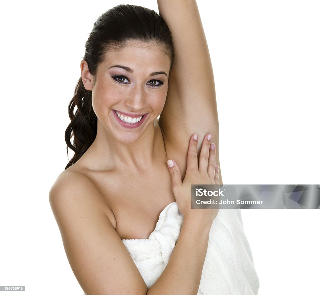 Woman with smooth skin Woman wearing a towel and stroking her smooth armpit  20-24 Years Stock Photo