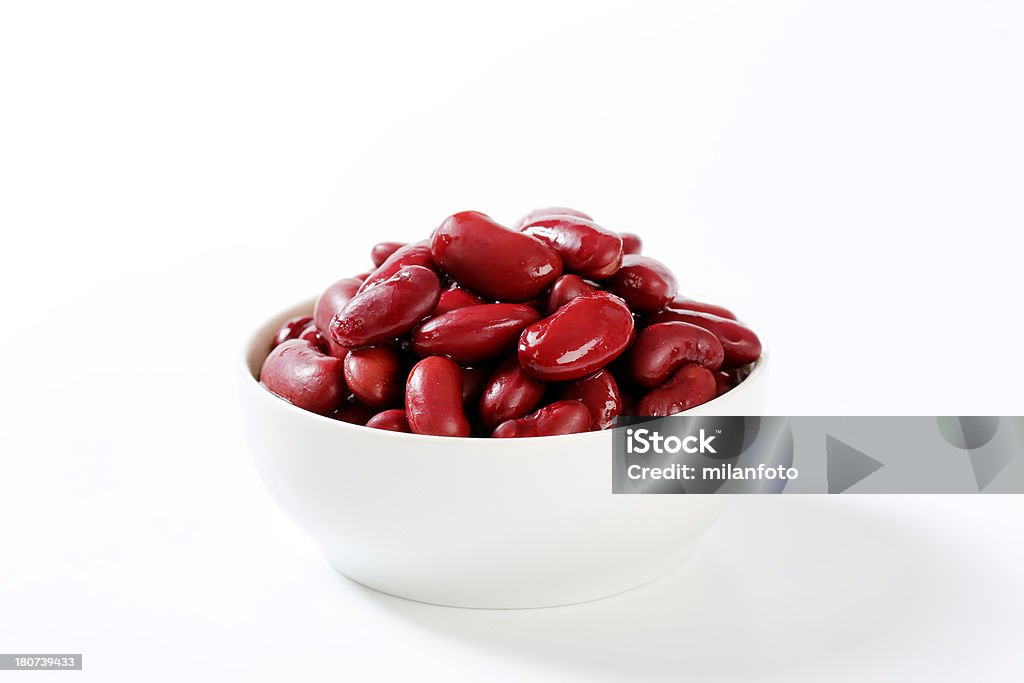 bowl of red beans bowl of cooked red beans on a white background Kidney Bean Stock Photo