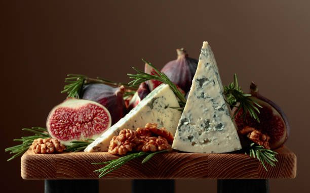istock Blue cheese with figs, walnuts, and rosemary. 1807395527