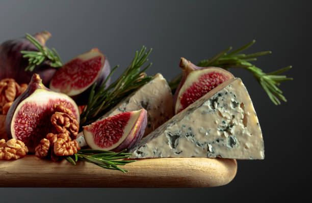 istock Blue cheese with figs, walnuts, and rosemary. 1807396041