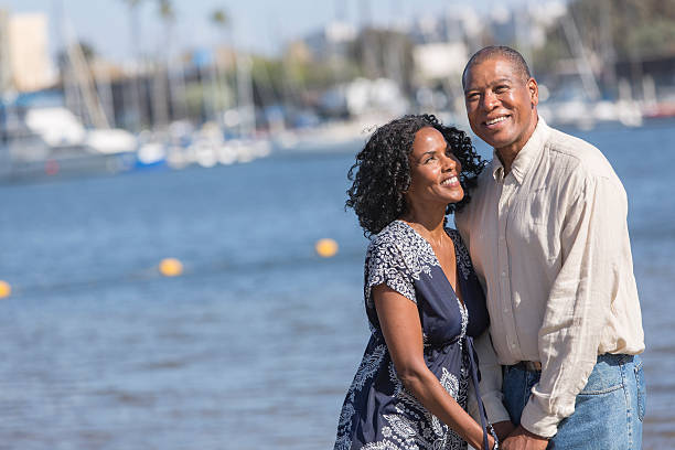 istock Hugging Couple at the Beach 180739623