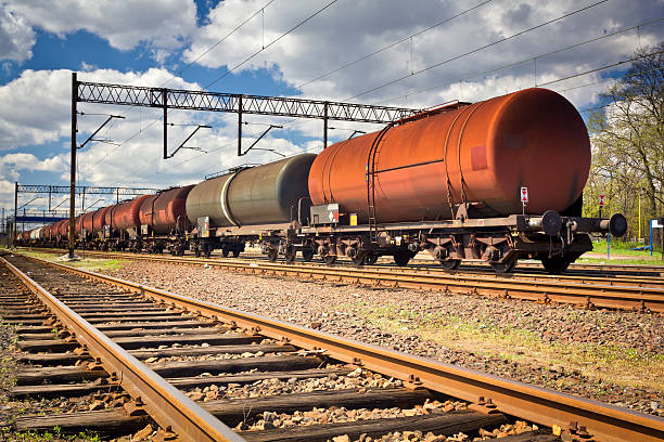istock Freight train with tank wagons in the railway siding 180739846