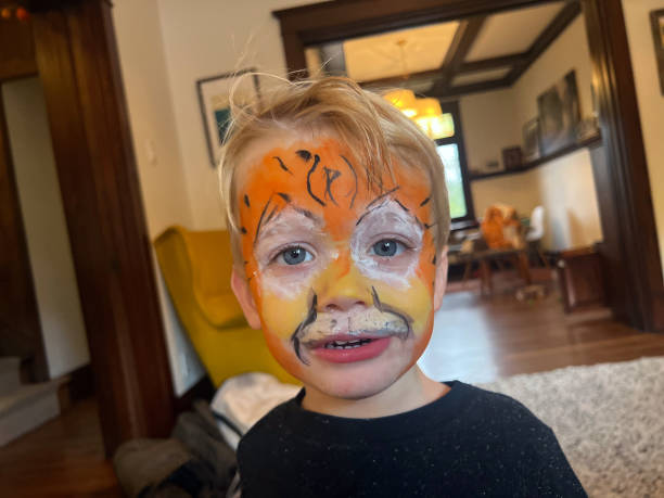 istock Little Boy with Tiger Face Paint 1807399868