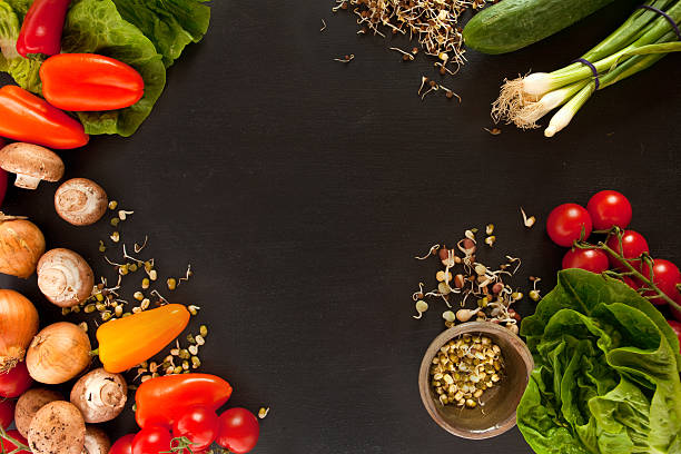istock Farmer's market board with colorful vegetables arranged on a table 180740009