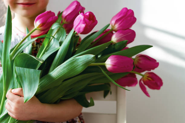 istock A large bouquet in children's hands. 1807406421