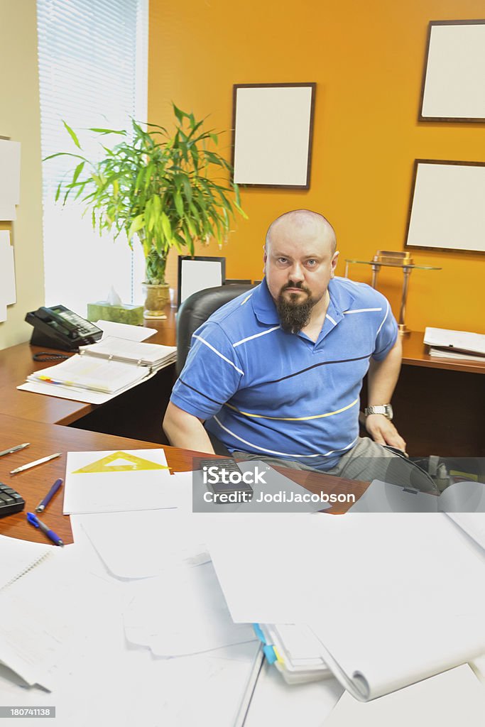 Unternehmer an seinem Schreibtisch - Lizenzfrei Arbeiten Stock-Foto