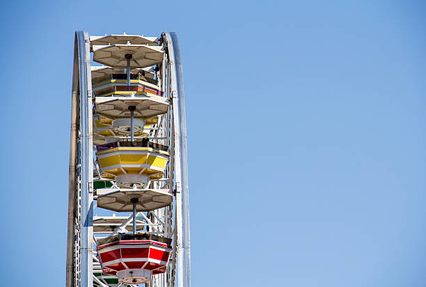 istock Ferris wheel against a clear blue sky 180741190