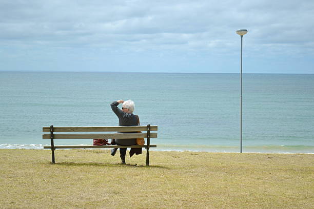 istock Woman waiting for someone, at the beach 180741550