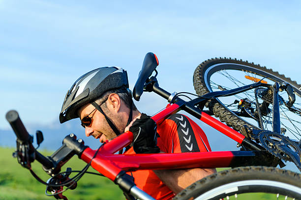 istock man with bike 180741911
