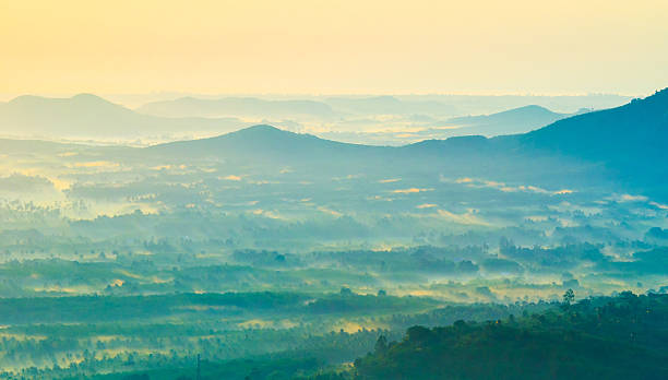 istock Beautiful sunrise at misty morning mountains . 180743204